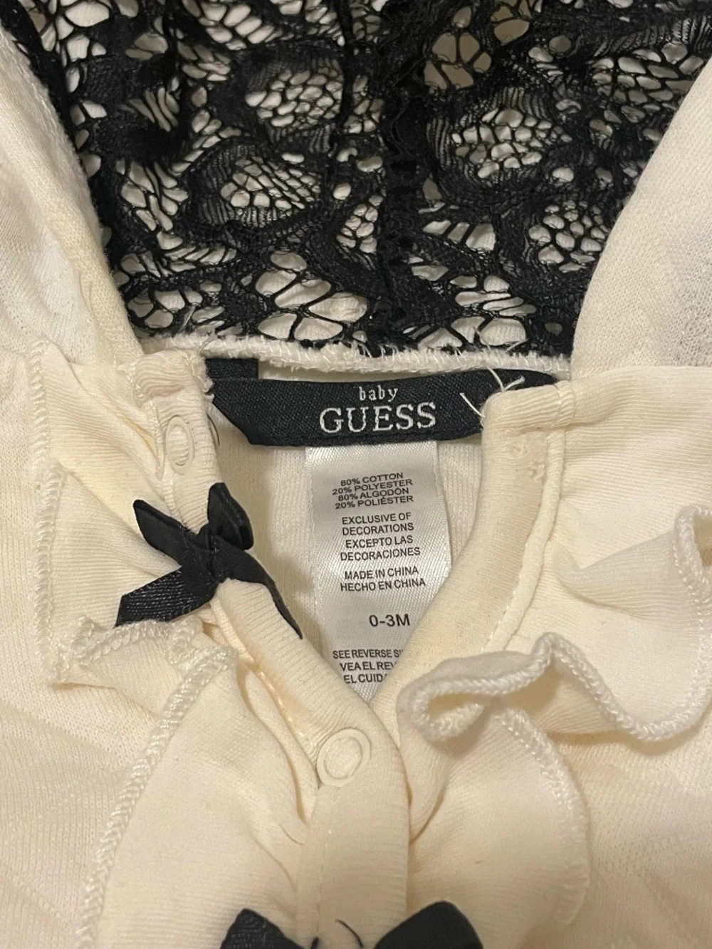 Guess cream colored onesie